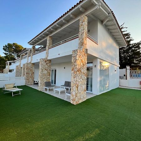 Case Vacanze "Bianco Mare" Porto Pino Kültér fotó