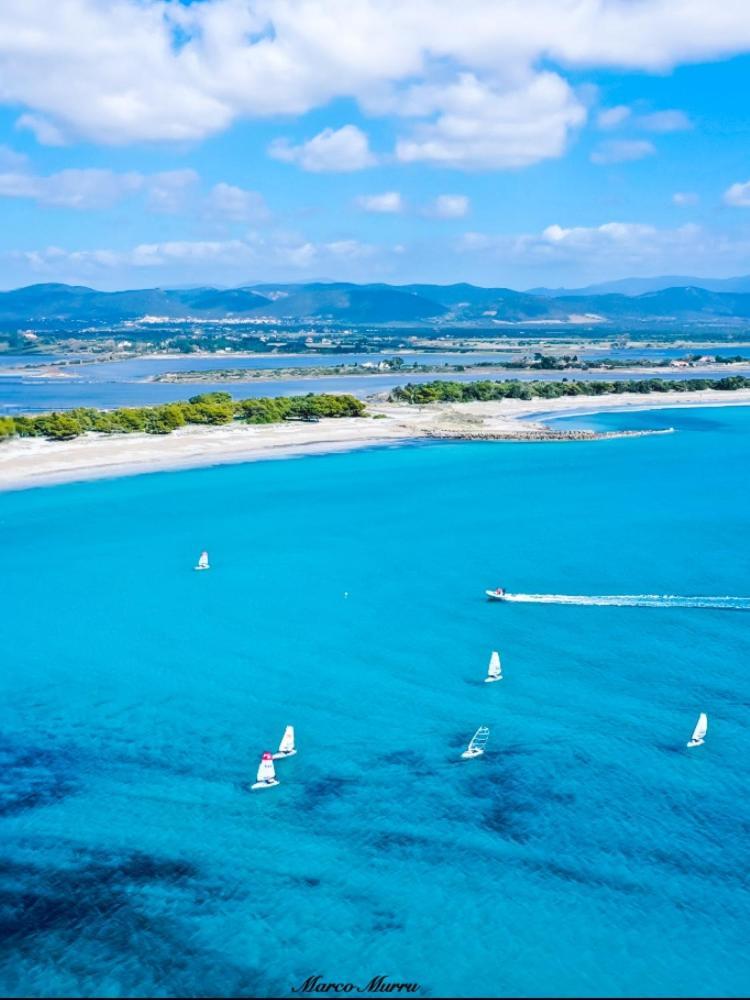 Case Vacanze "Bianco Mare" Porto Pino Kültér fotó
