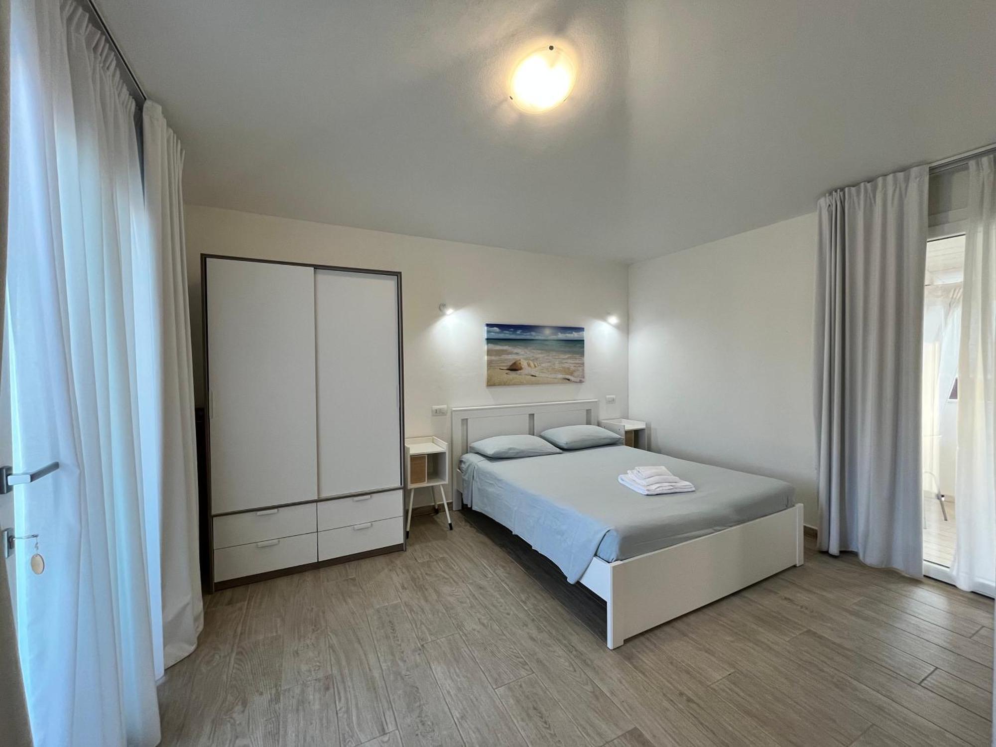 Case Vacanze "Bianco Mare" Porto Pino Kültér fotó