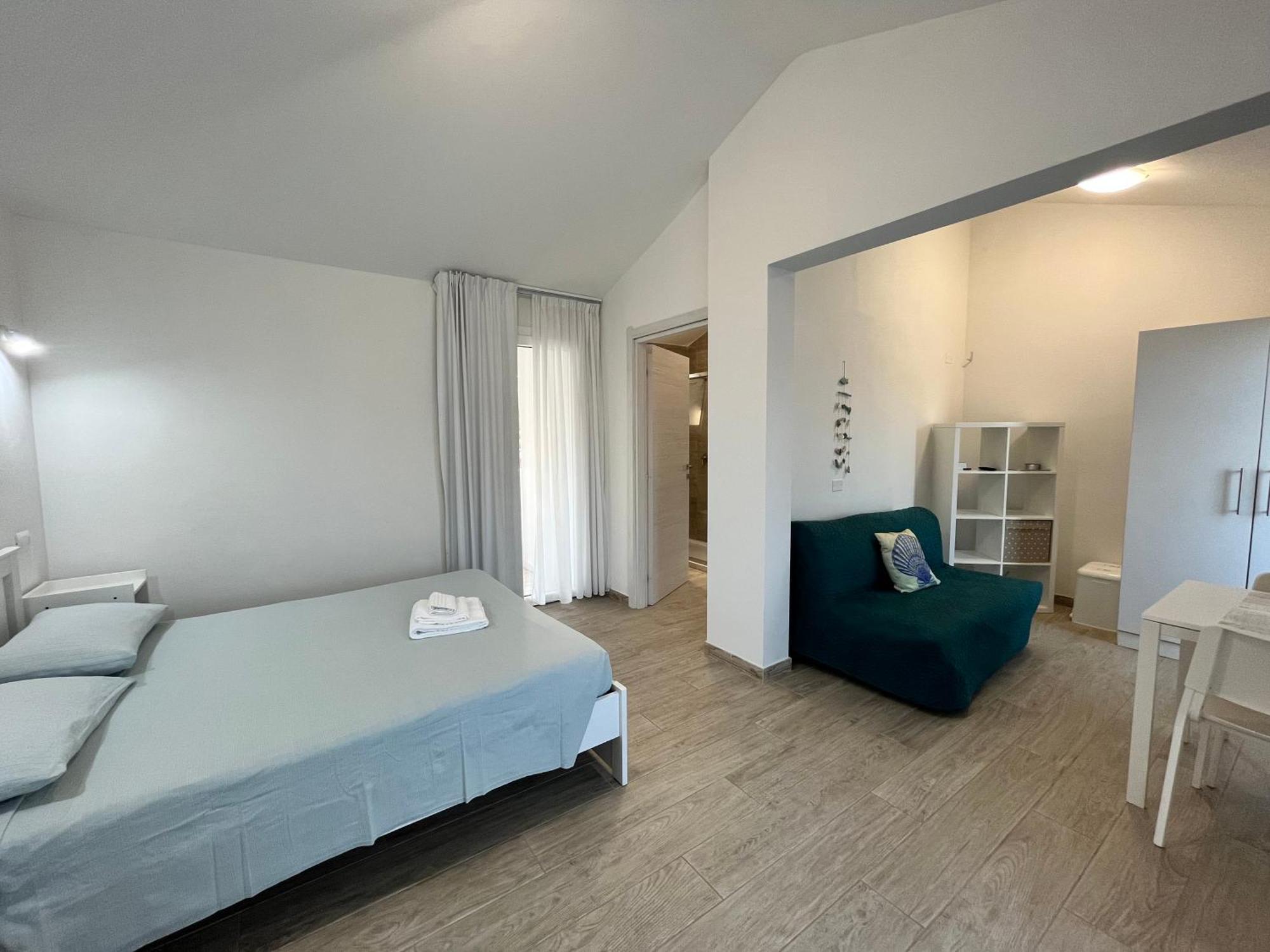 Case Vacanze "Bianco Mare" Porto Pino Kültér fotó