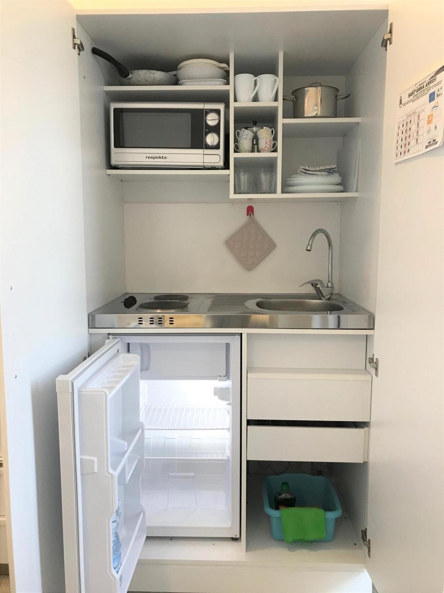 Case Vacanze "Bianco Mare" Porto Pino Szoba fotó
