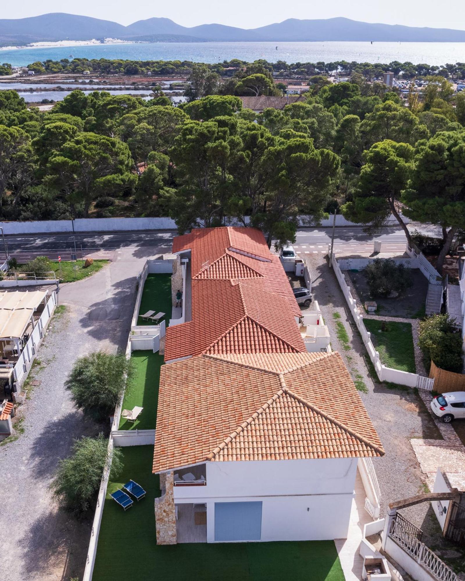 Case Vacanze "Bianco Mare" Porto Pino Kültér fotó