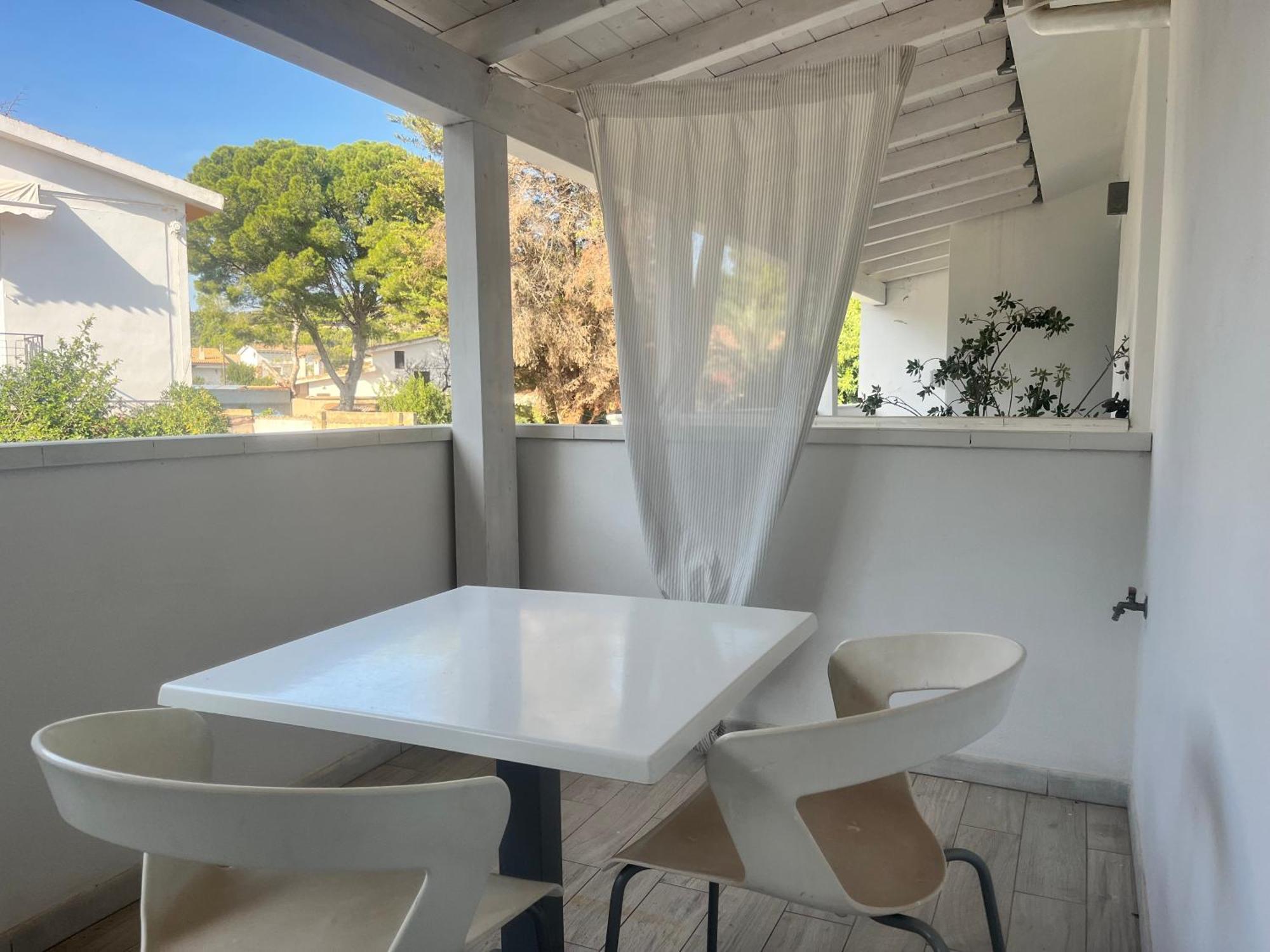Case Vacanze "Bianco Mare" Porto Pino Kültér fotó